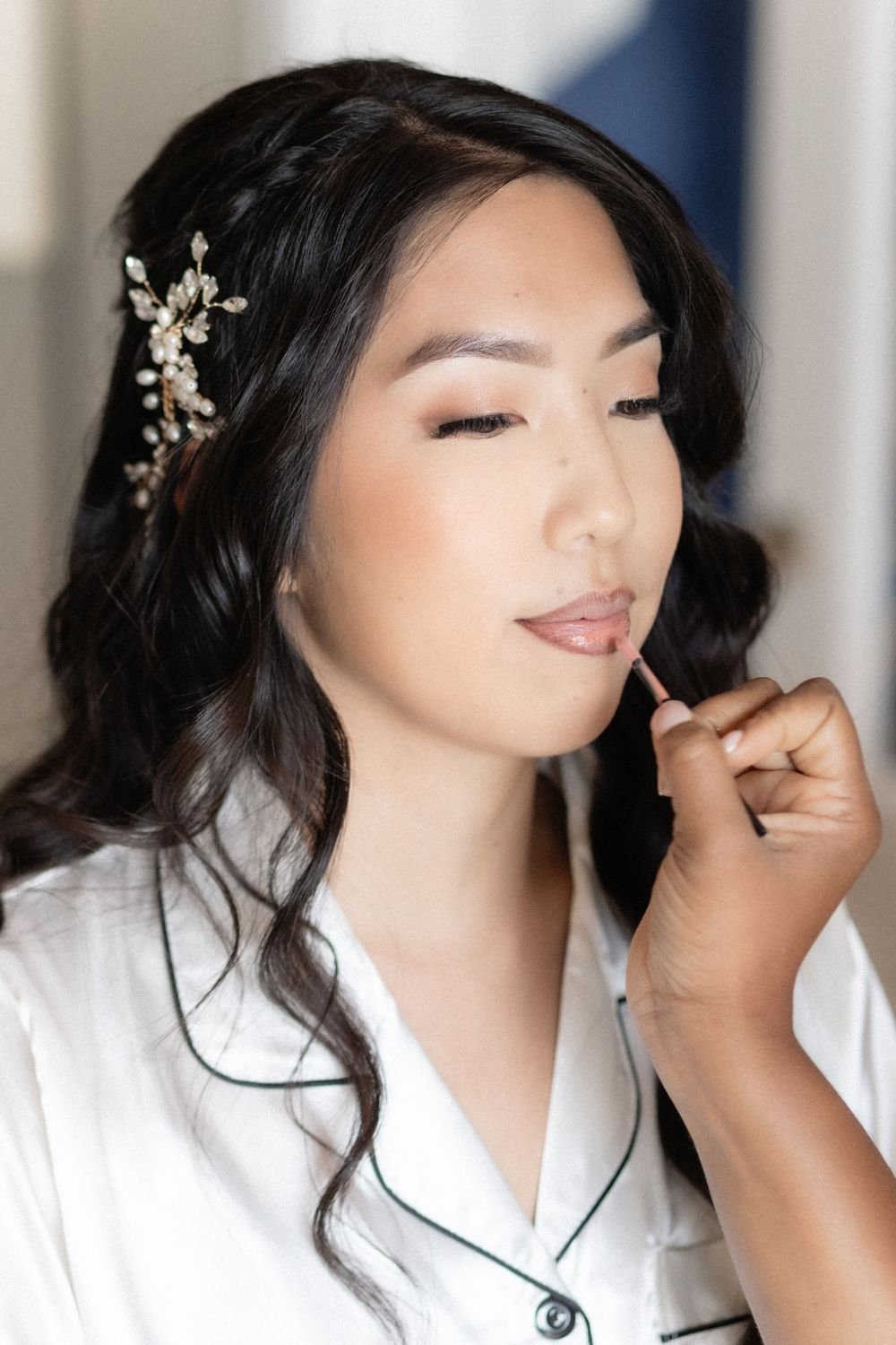 Bride looking out window
